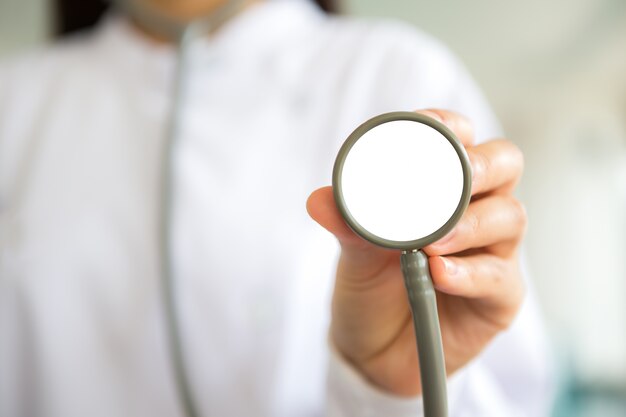 Stethoscope in the hands of a doctor