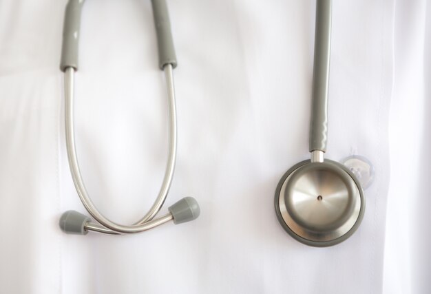 Stethoscope hanging from a doctor's gown