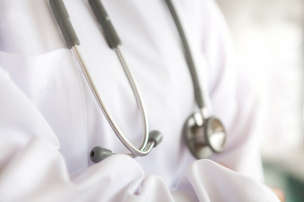 Stethoscope hanging from a doctor's gown