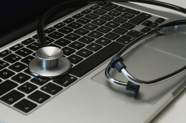 Stethoscope on laptop