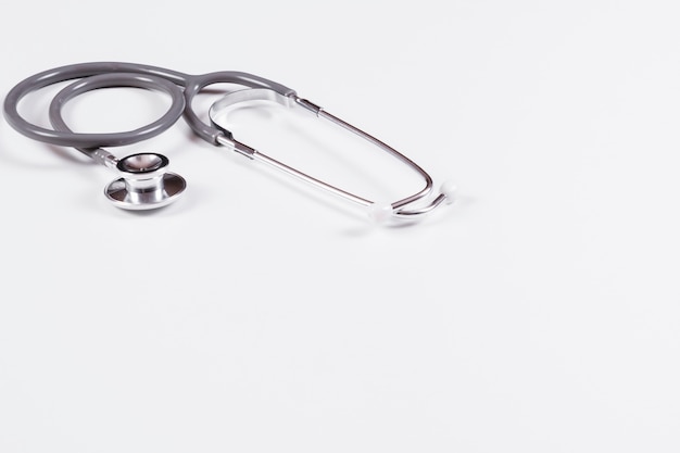 Free photo stethoscope over white background