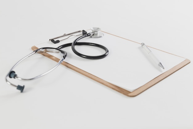 Stethoscope with checklist and pen
