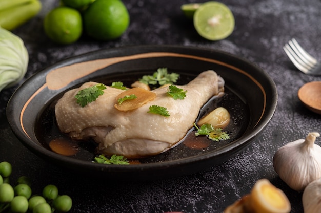 Stewed chicken drumsticks, galangal, garlic and lemon