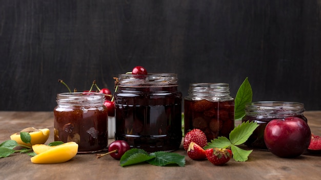 Free photo stewed fruit jars arrangement