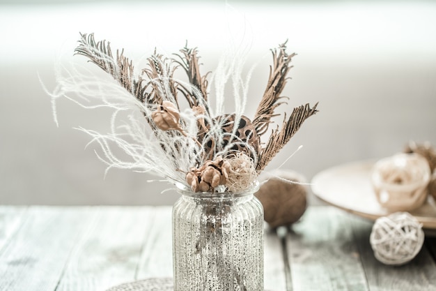 Free photo still life beautiful vase with dried flowers .