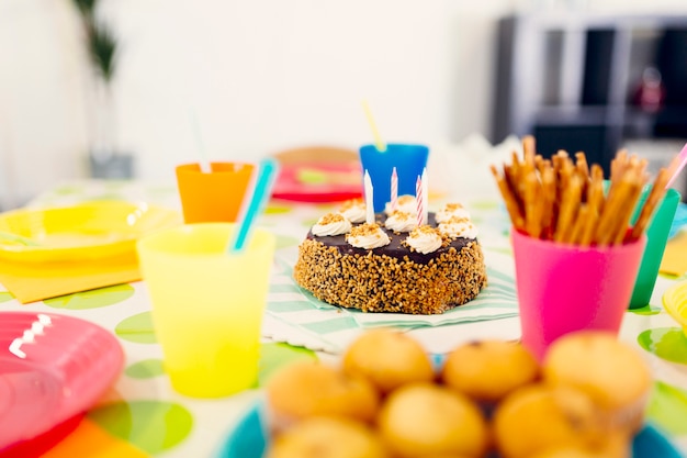 Still life birthday snacks on table