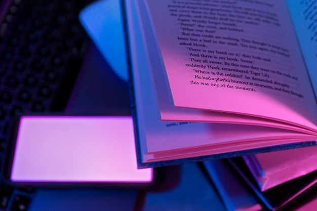 Free photo still life of books versus technology