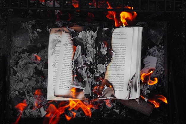 Free photo still life of burnt paper with flames