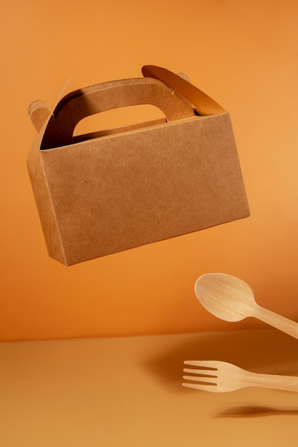 Still life of cardboard organic dinnerware