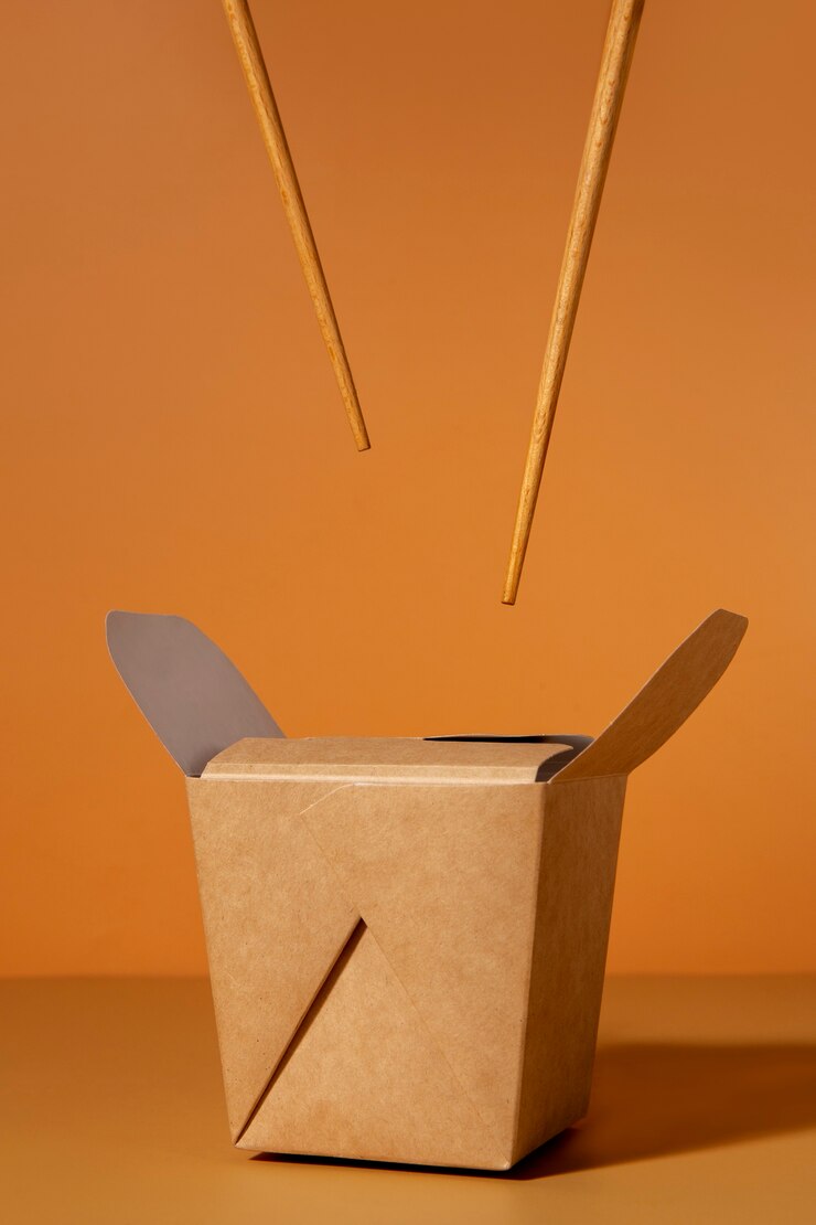 Free Photo still life of cardboard organic dinnerware