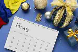 Free photo still life of christmas calendar with colombian flag