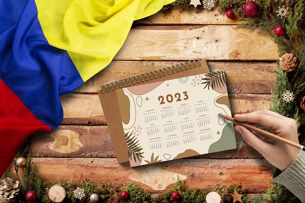 Still life of christmas calendar with colombian flag