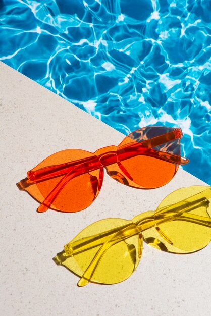 Still life of colored transparent sunglasses