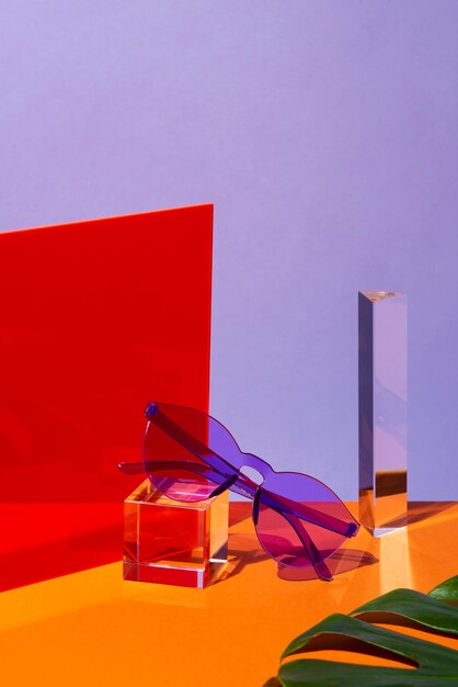 Still life of colored transparent sunglasses