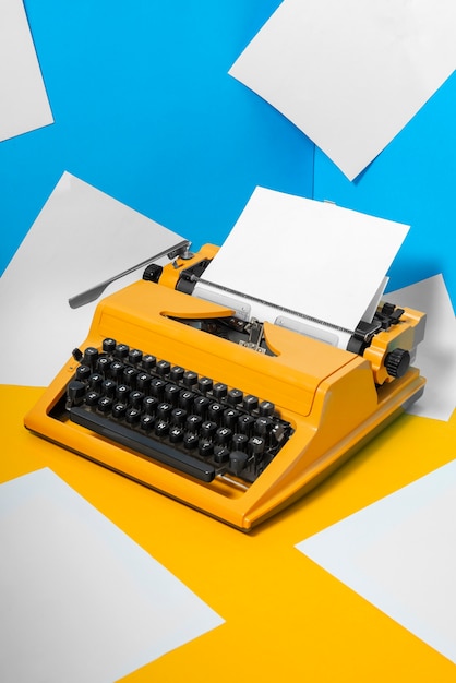 Free photo still life of colorful typewriter