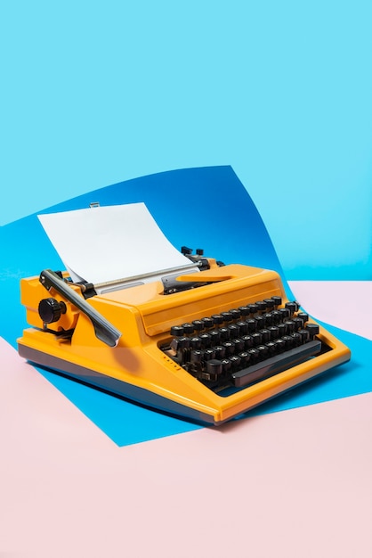 Free photo still life of colorful typewriter