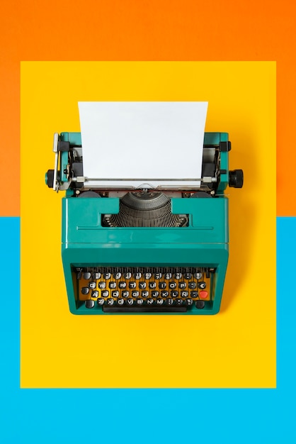 Free photo still life of colorful typewriter