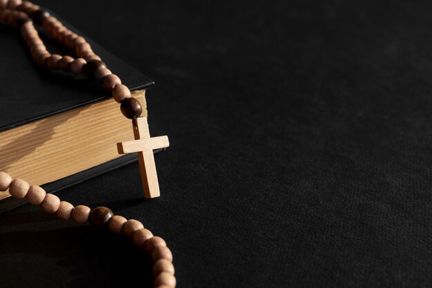 Still life of crucifix with beads