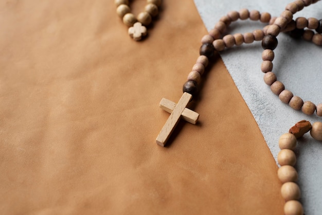 Still life of crucifix with beads