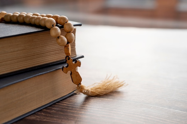 Still life of crucifix with book