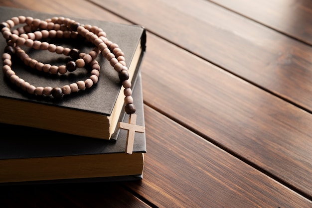 Still life of crucifix with book