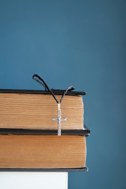 Still life of crucifix with book