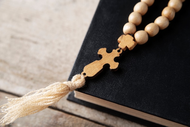 Still life of crucifix with book