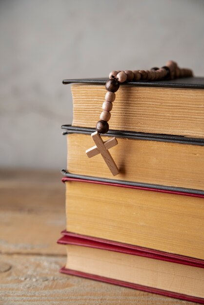 Still life of crucifix with book