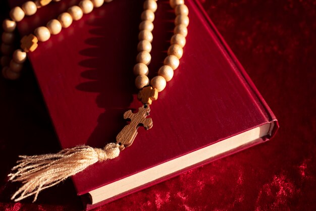 Still life of crucifix with book