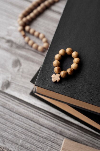 Still life of crucifix with book