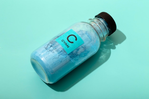 Free photo still life cyan toner arrangement isolated