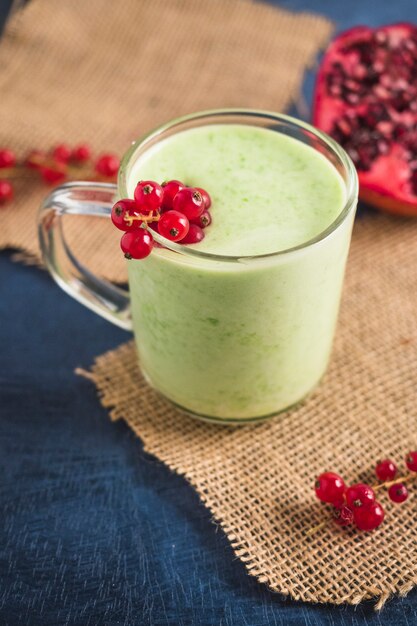 Still life of delicious green smoothie