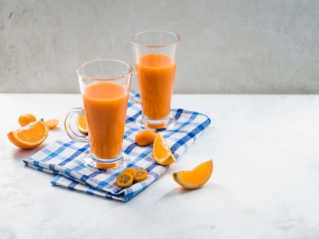 Still life of delicious orange smoothie
