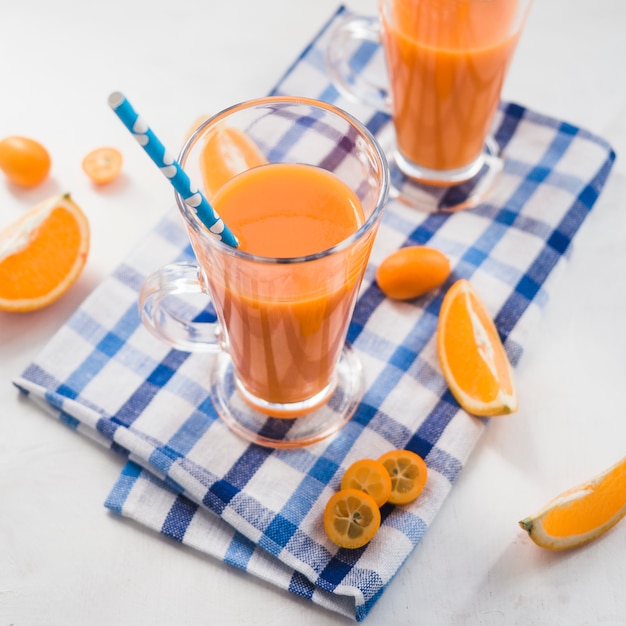 Still life of delicious orange smoothie