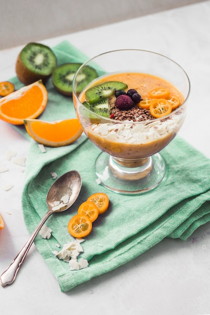 Free photo still life of delicious orange smoothie