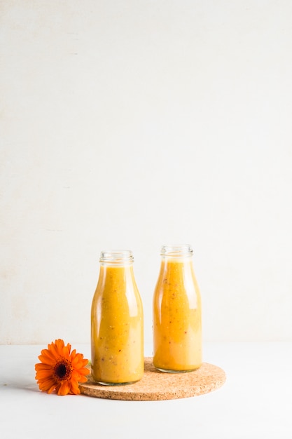 Still life of delicious orange smoothie