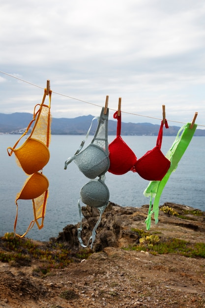 Still life of different types of bras outdoors