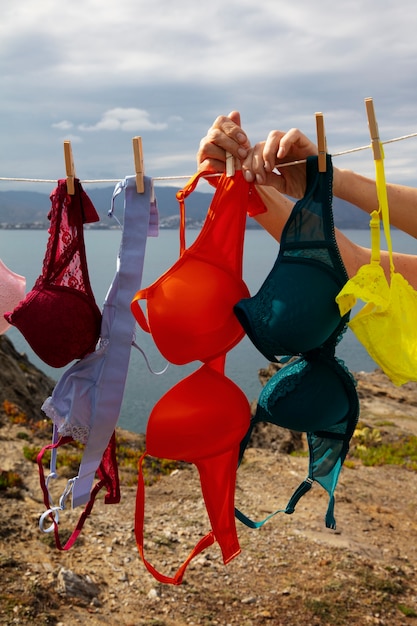 Still life of different types of bras outdoors