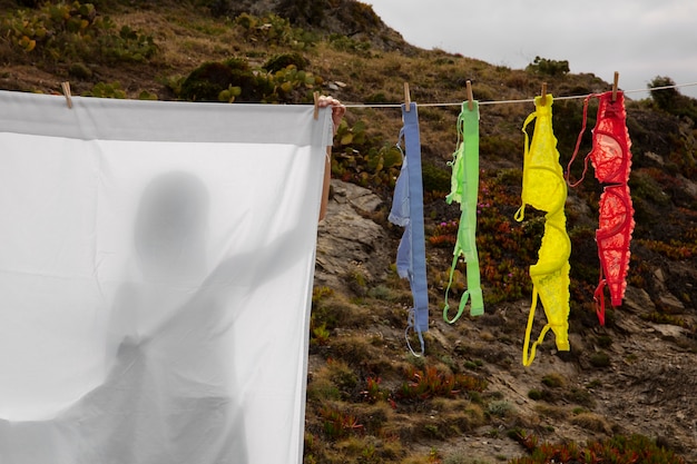 Still life of different types of bras outdoors