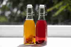 Free photo still life of kombucha bottle