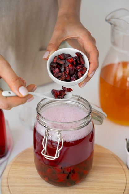 Free photo still life of kombucha bottle