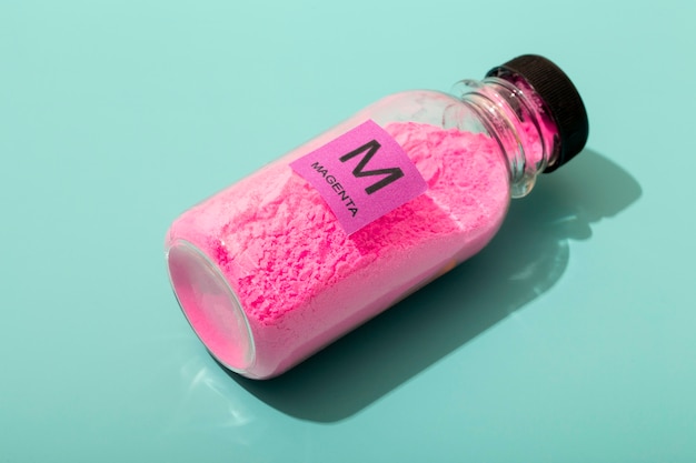 Free photo still life magenta toner arrangement isolated