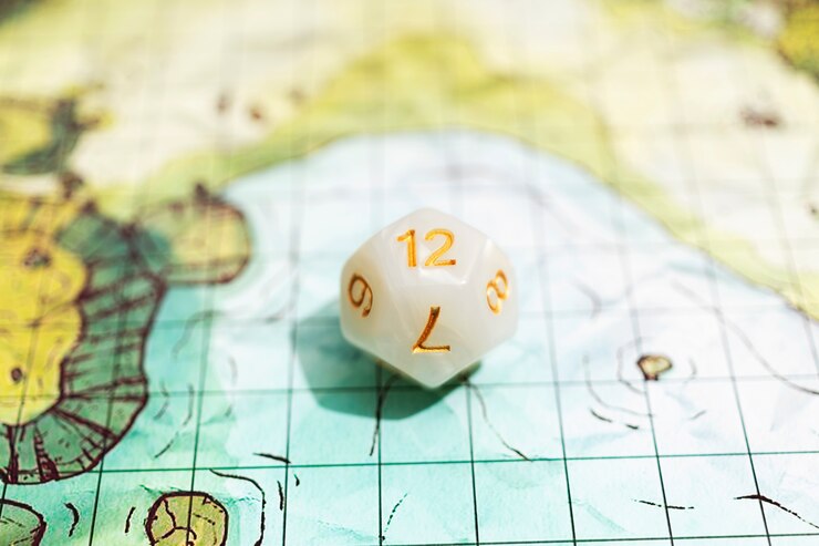 Free Photo still life of map with dices