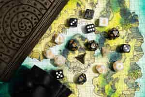 Free photo still life of map with dices