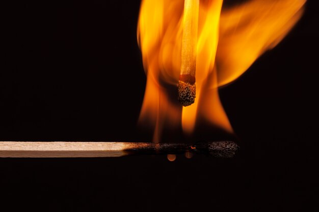 Still life of matches burning