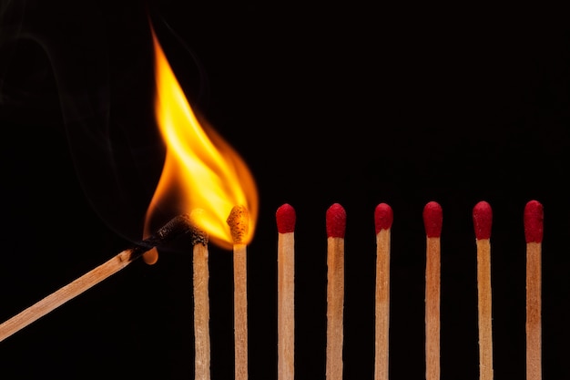 Still life of matches burning