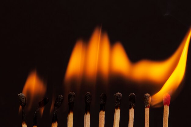 Still life of matches burning