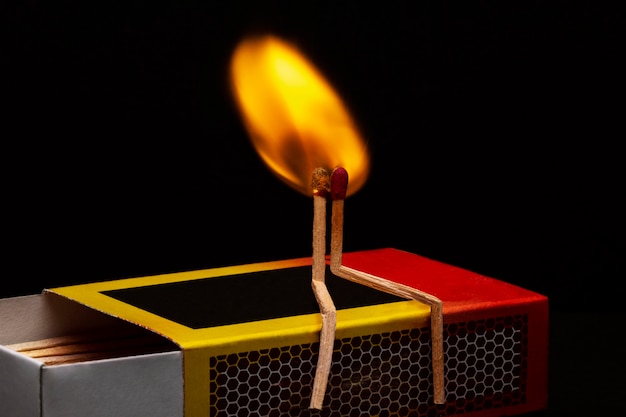 Still life of matches burning