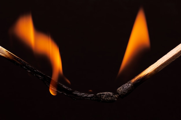 Still life of matches burning