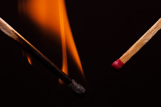 Still life of matches burning